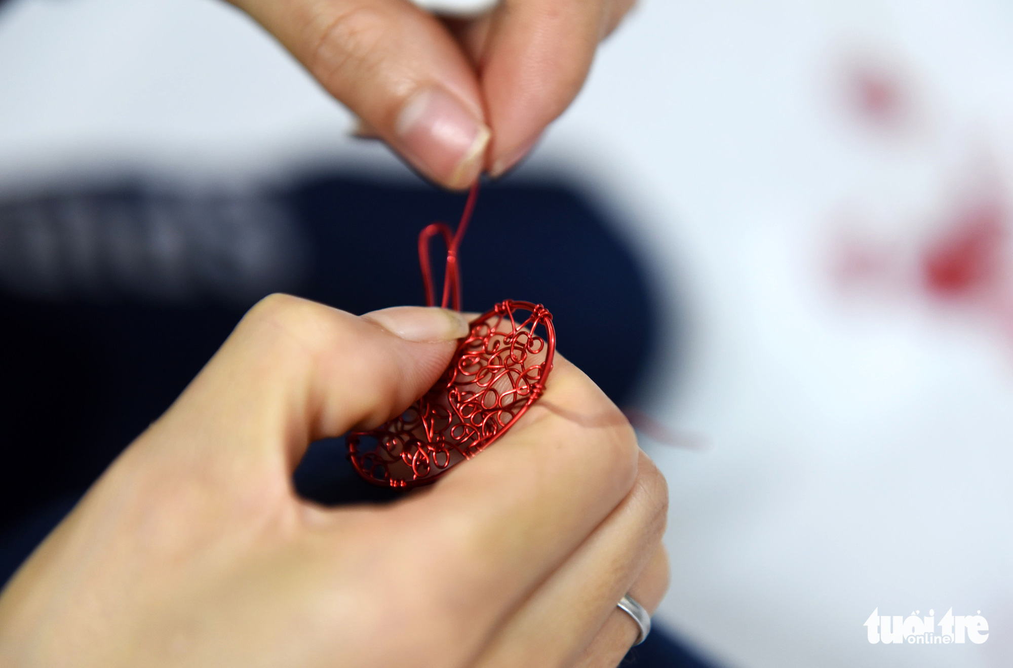Ornaments are created with copper wires at an art class in Ho Chi Minh City, Vietnam. Photo: Duyen Phan / Tuoi Tre