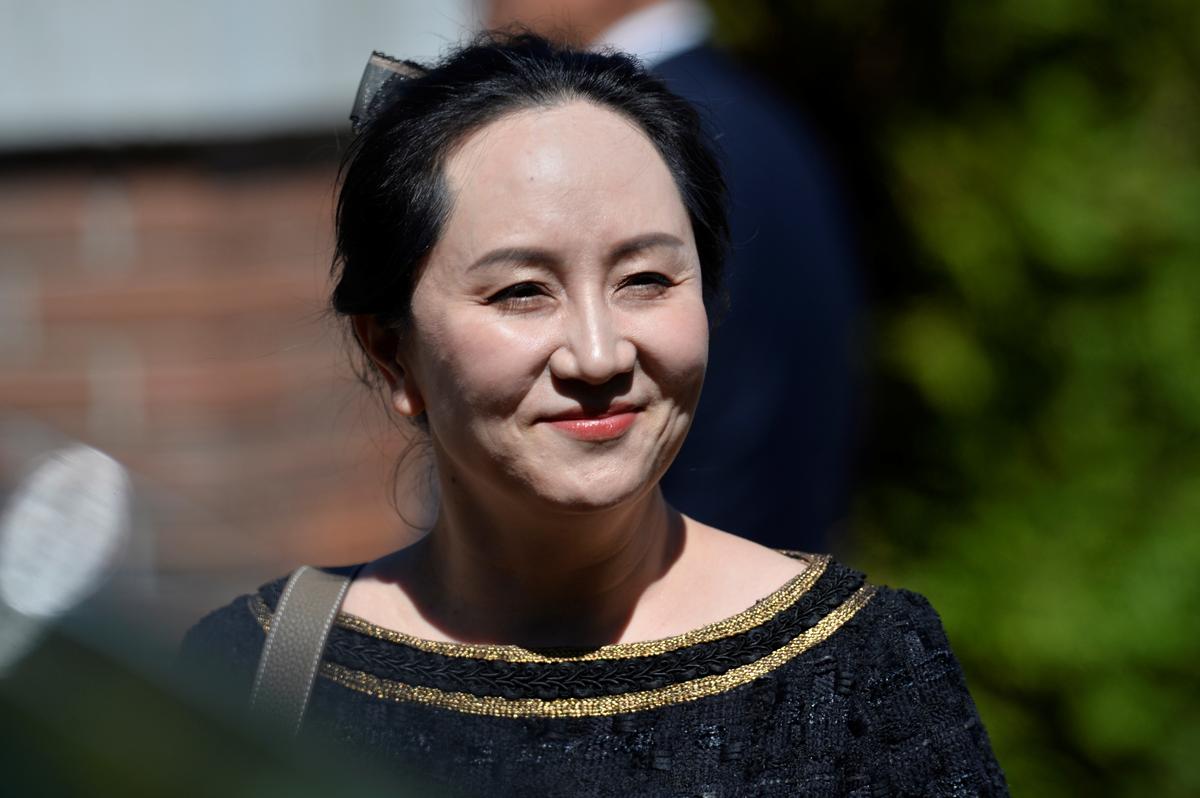 Huawei Technologies Chief Financial Officer Meng Wanzhou smiles as she leaves her home to attend a court hearing in Vancouver, British Columbia, Canada May 27, 2020. Photo: Reuters