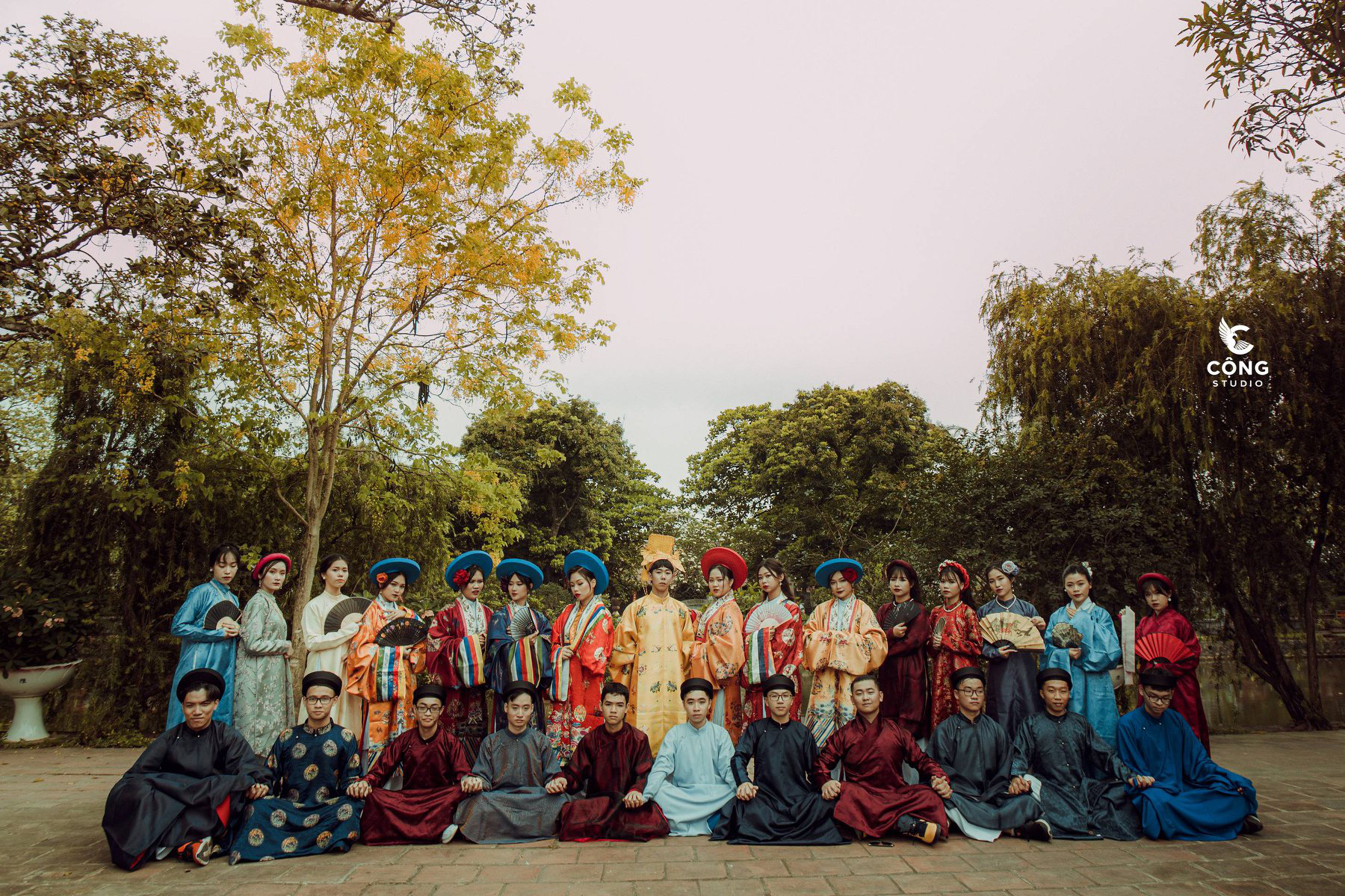 12th-grade French majors at the Le Hong Phong High School for the Gifted in Nam Dinh Province, Vietnam pose for a ‘royal family photo’ at the Tran Temple wearing ancient costumes in this supplied yearbook photo.