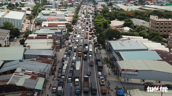 An aerial view of a congestion caused by a serial traffic accident on National Highway 1 in District 12, Ho Chi Minh City, June 6, 2020. Photo: Ngoc Khai / Tuoi Tre