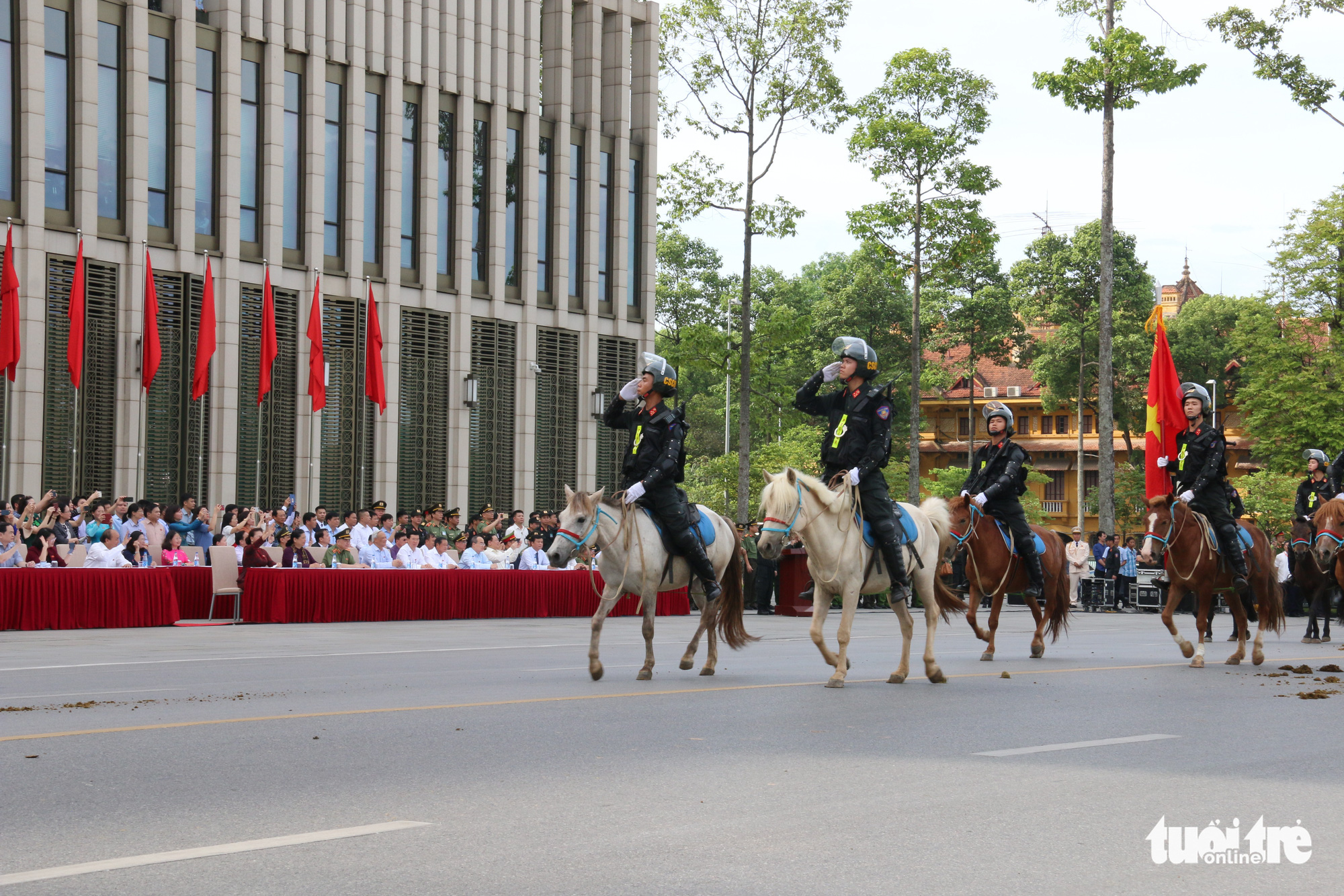 Officers from the Mounted Mobile Police Corps march during a ceremony at Ba Dinh Square in Hanoi, Vietnam, June 8, 2020. Photo: Tien Long / Tuoi Tre