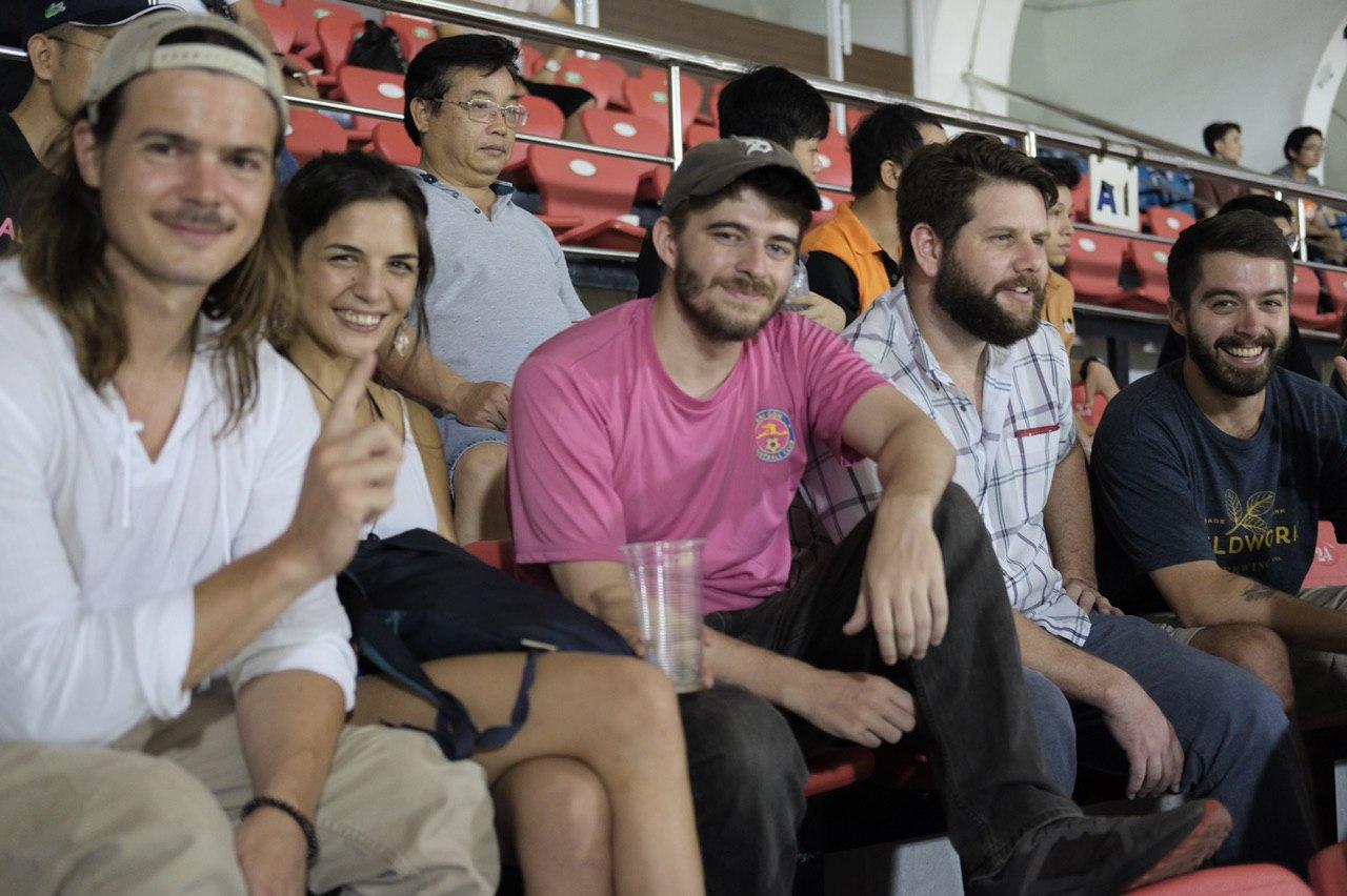 United States’ Christ Brown (left) and Peter Stroud (third left) and friends attend a V-League 1 football game between Saigon FC and Hong Linh Ha Tinh at Thong Nhat Stadium in Ho Cho Minh City, Vietnam, June 24, 2020. photo: Tuan Son / Tuoi Tre News
