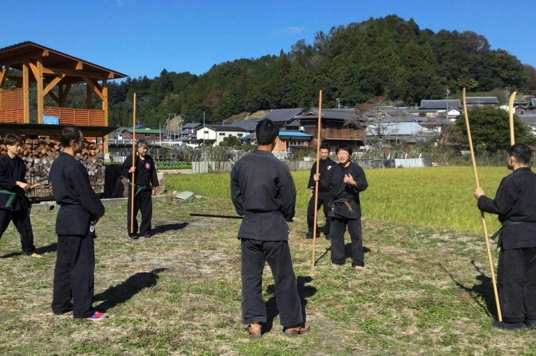 This undated handout photo received on June 26, 2020 courtesy of Genichi Mitsuhashi (second right) shows his ninja training in Iga, Mie prefecture. Photo: AFP