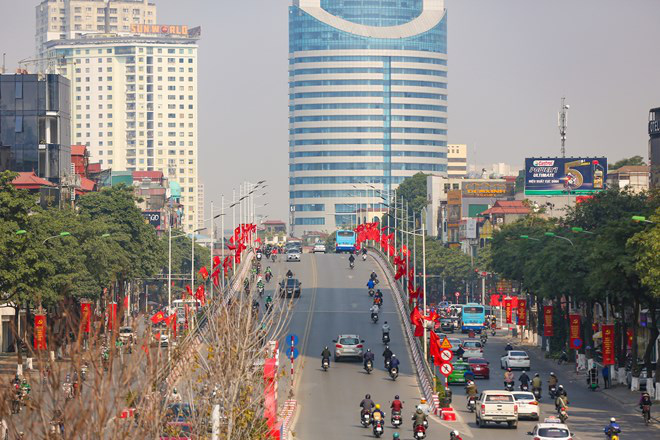 An overpass is decked out in flags to prepare for the 13th National Party Congress in Hanoi. Photo: Vietnam News Agency