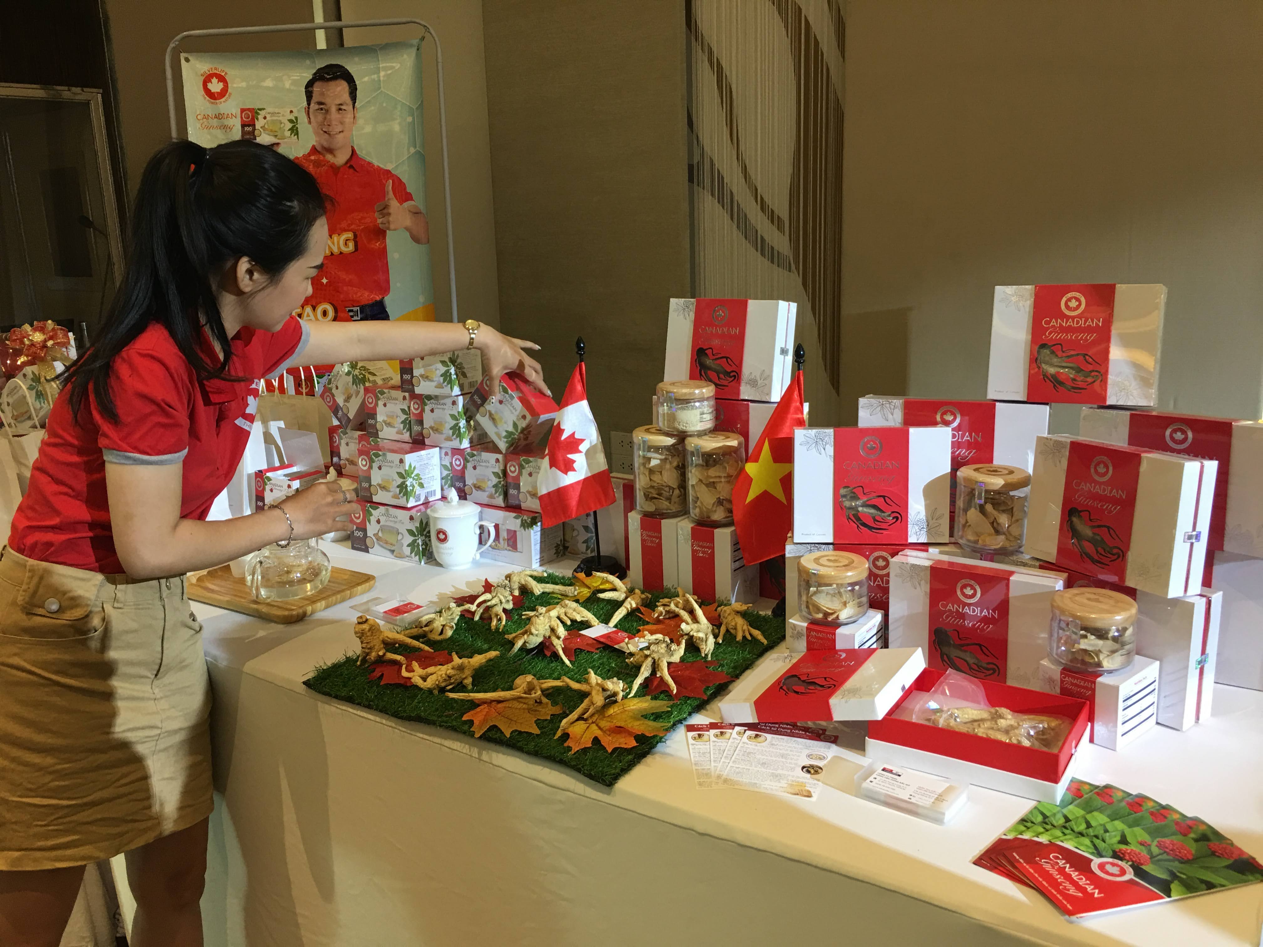 A staff prepares products from Canadian ginseng displayed at an event to promote Canadian ginseng hosted by the Consulate General of Canada in Ho Chi Minh City in January. Photo: Dong Nguyen/ Tuoi Tre News