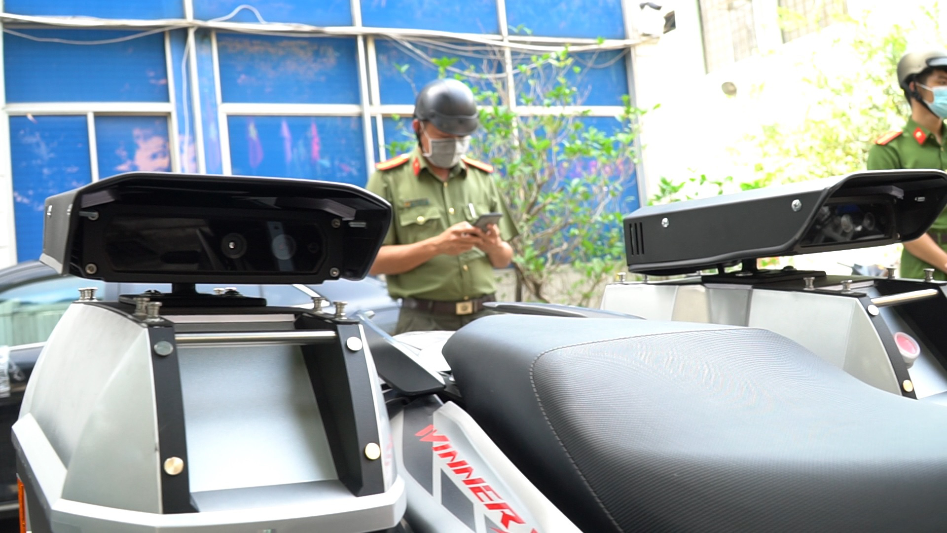 The special motorbike has two cameras on each of its side to scan license plates of vehicles. Photo: D. T. / Tuoi Tre