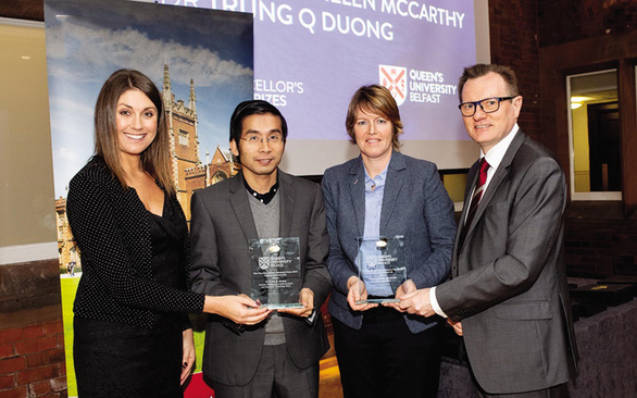 Prof.Dr. Duong Quang Trung receives the 2018 Research Innovation Award at Queen's Belfast University in the United Kingdom in this supplied photo.